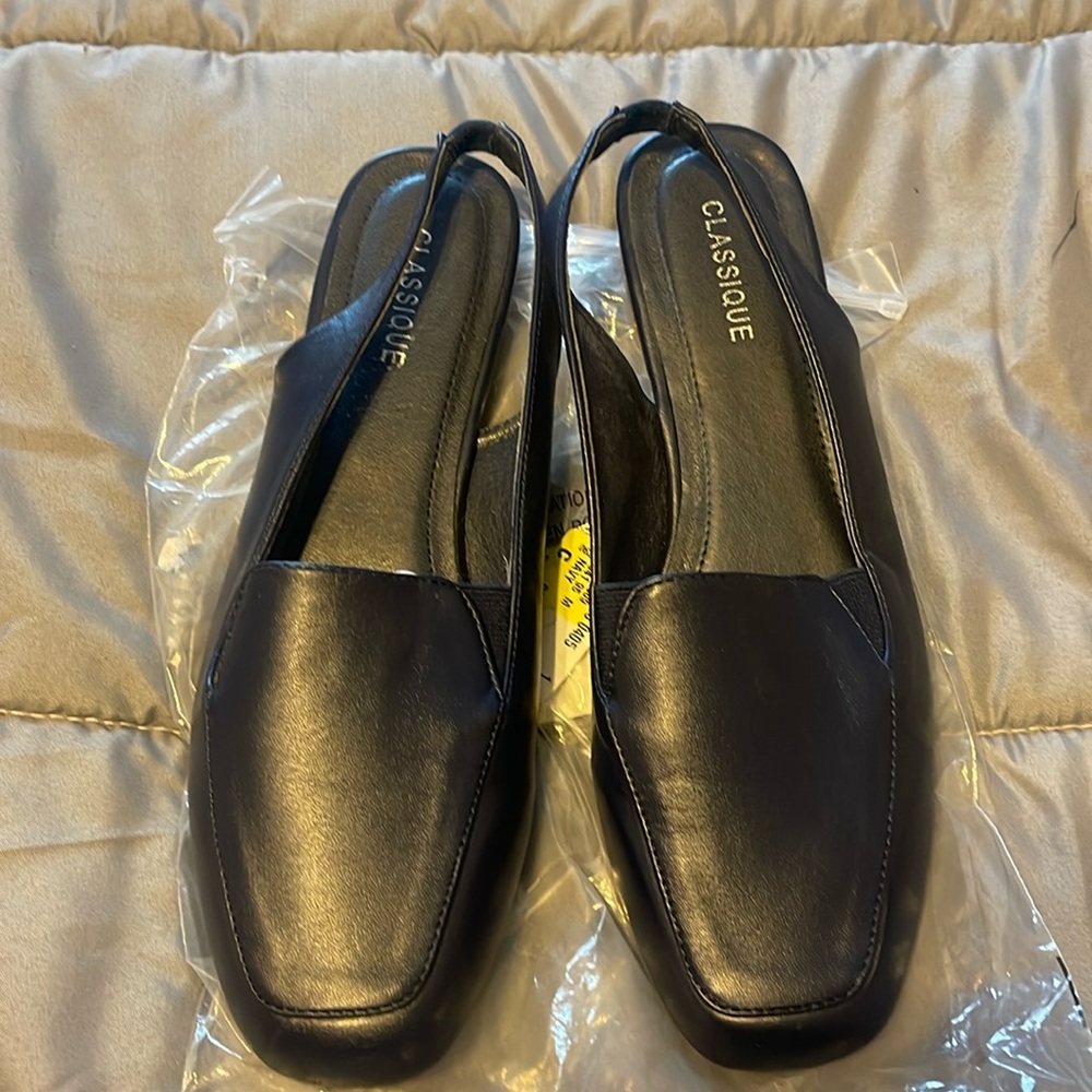 Used navy blue sling back.